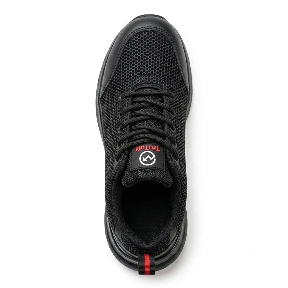 TruTuff Glide top view — hexagonal honeycomb breathable mesh upper, lace-up safety shoe