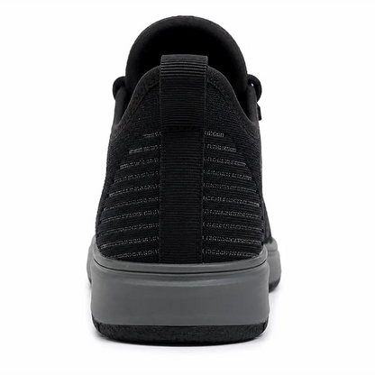 TruTuff Volt back view — pull tab, breathable knit heel, grey rubber sole, 11kV anti-shock safety shoe